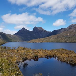 Scenic alpine vistas along Cradle Mountain National Park’s hiking tracks. The Tasmanian Adventure Company provides safe, reliable transport from Hobart.